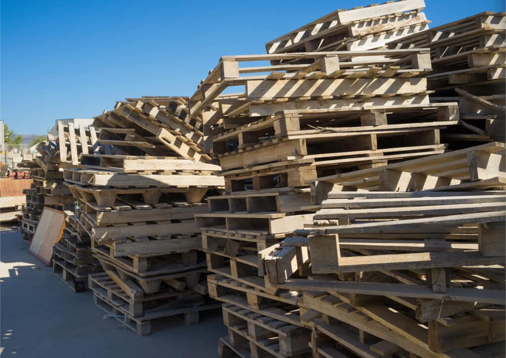 Used pallet cores stacked outside