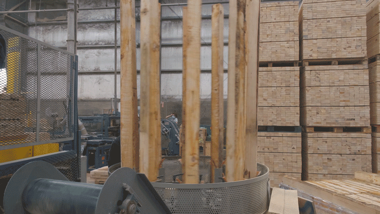 Animated GIF showing Kamps' capabilities at manufacturing 9-block pallets from scratch - including a block cutting machine and automated nailing machinery.